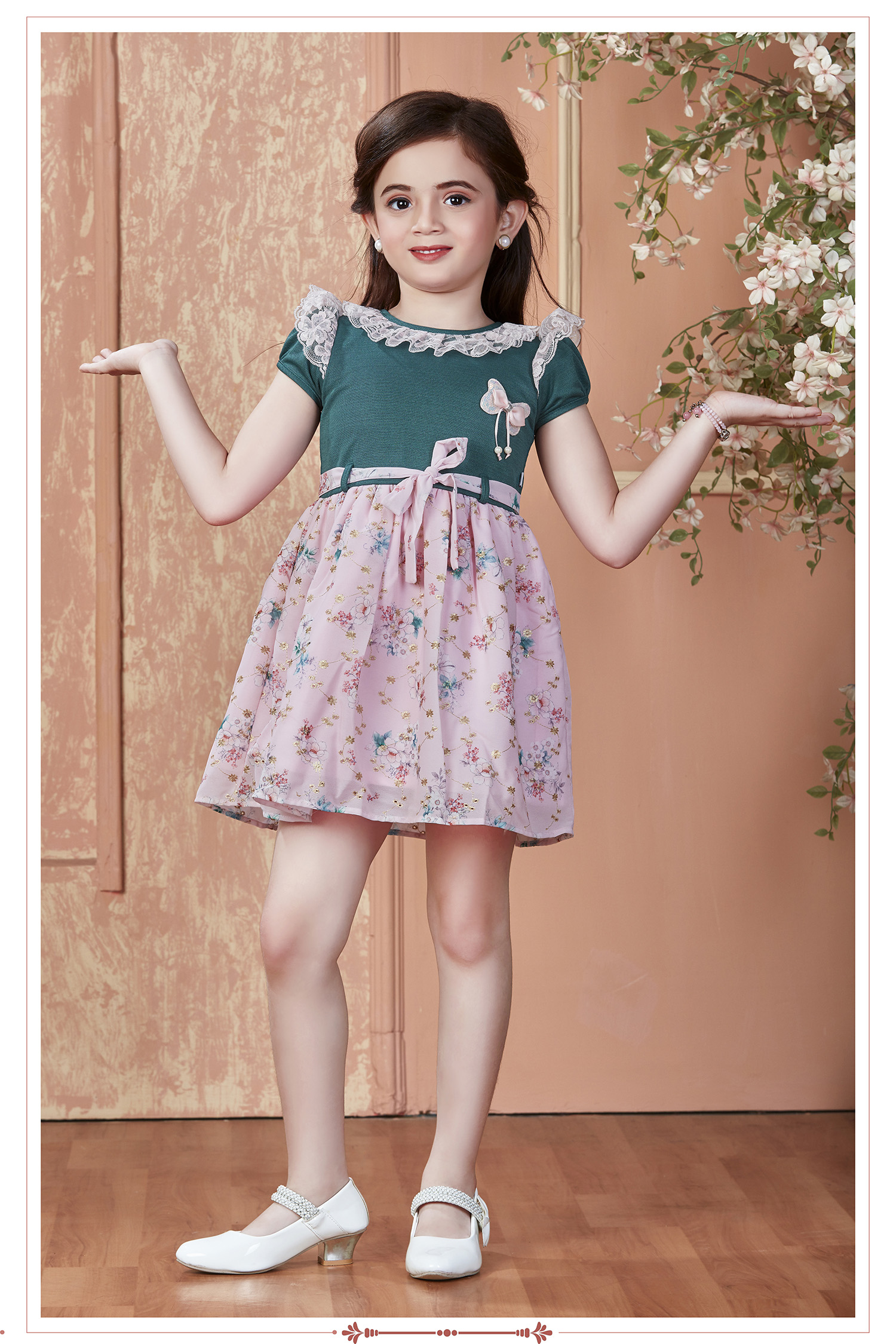 The Magic Wand Sleeveless Floral Printed Ruffle On Neck With Bow Dress For Girls